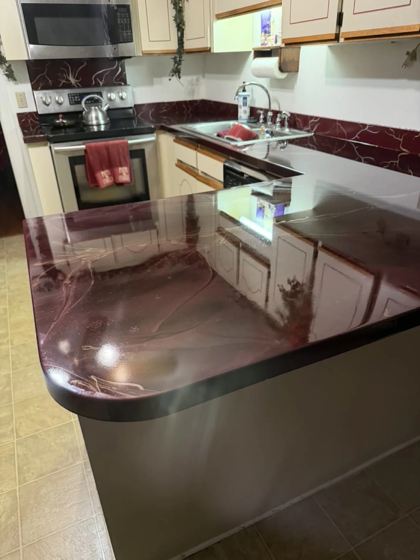 Burgundy metallic epoxy countertop in a Goldsboro, North Carolina kitchen
