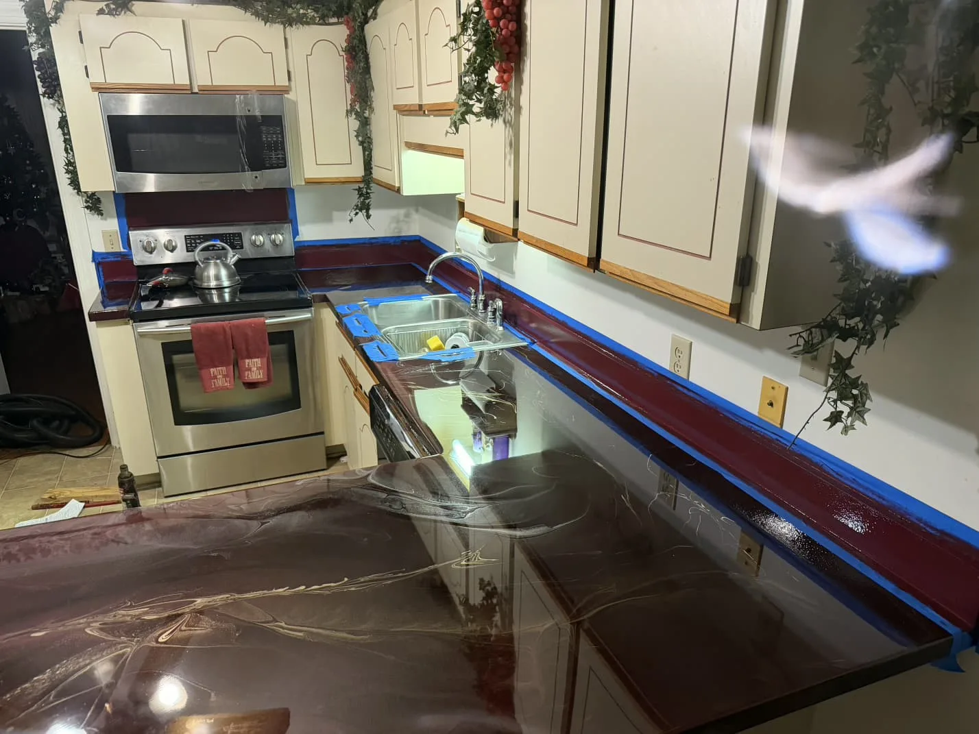 Maroon metallic epoxy countertop in a Goldsboro, North Carolina kitchen