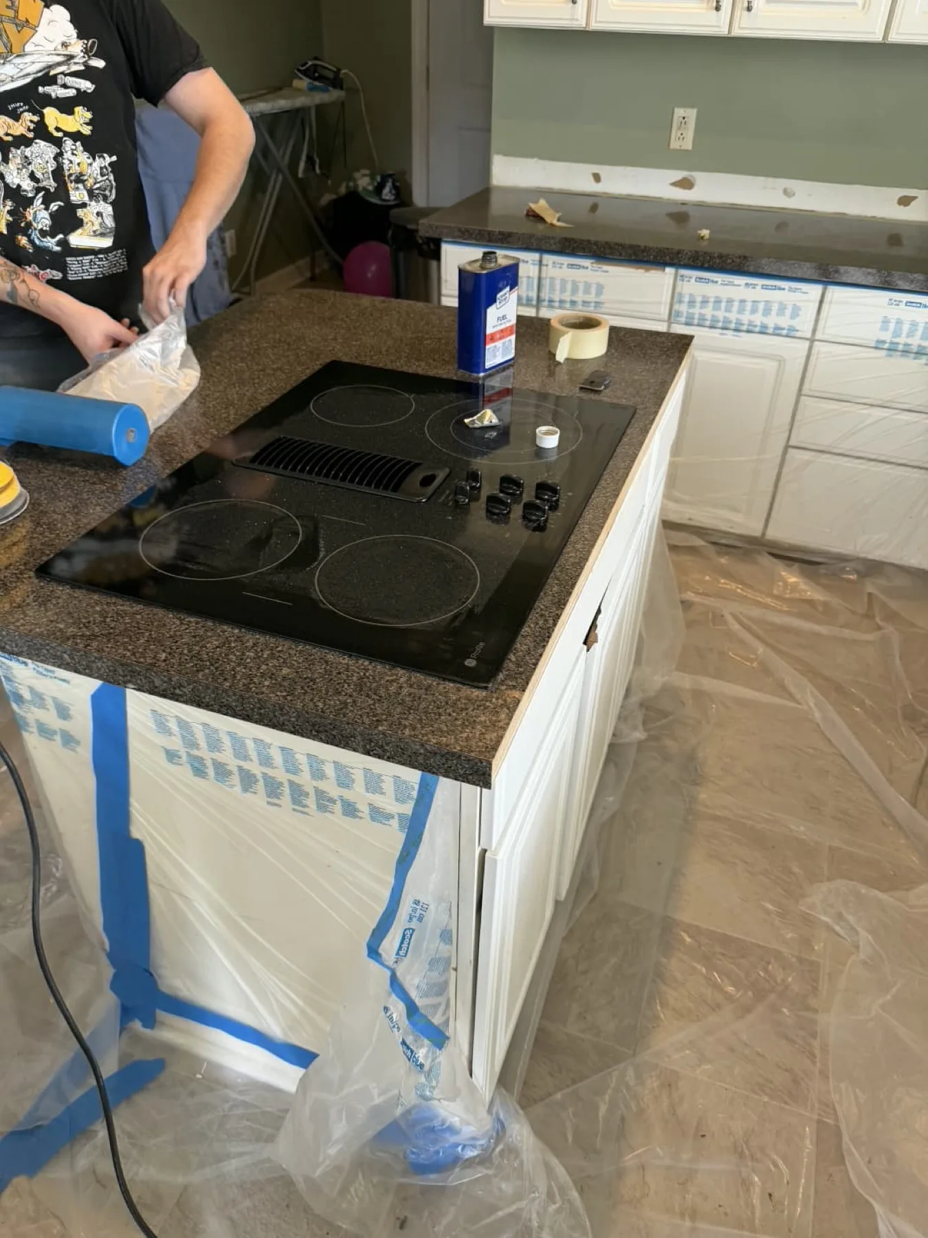 Kitchen island masked in plastic before an epoxy countertop pour in Goldsboro, North Carolina