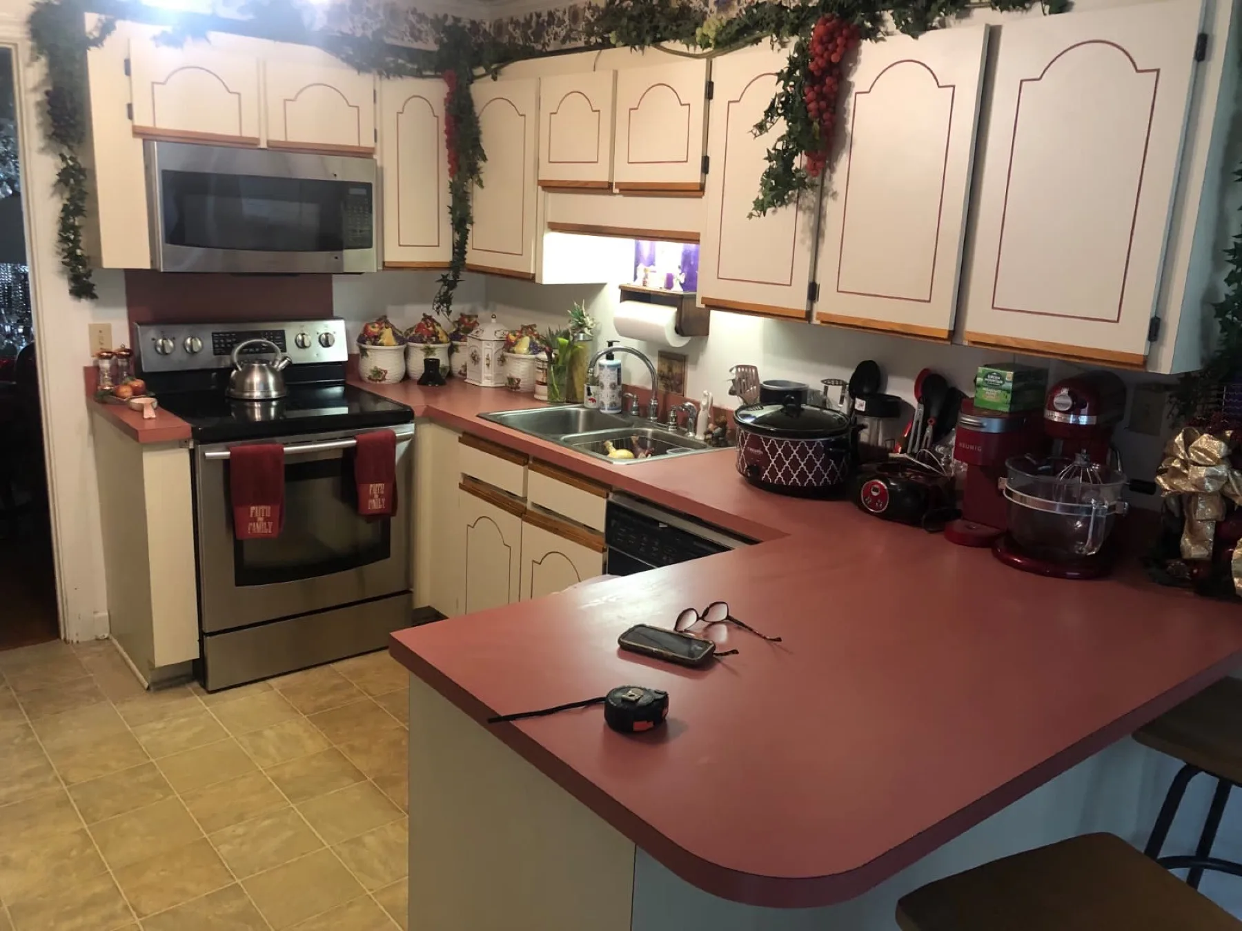 Kitchen with rose laminate counters before an epoxy pour in Wayne County, North Carolina